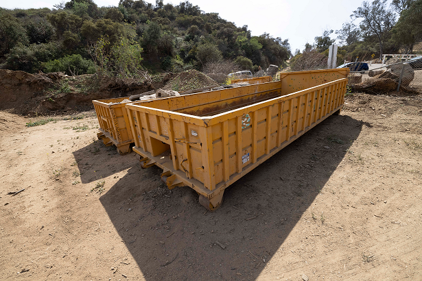 Yellow Roll off dumpster